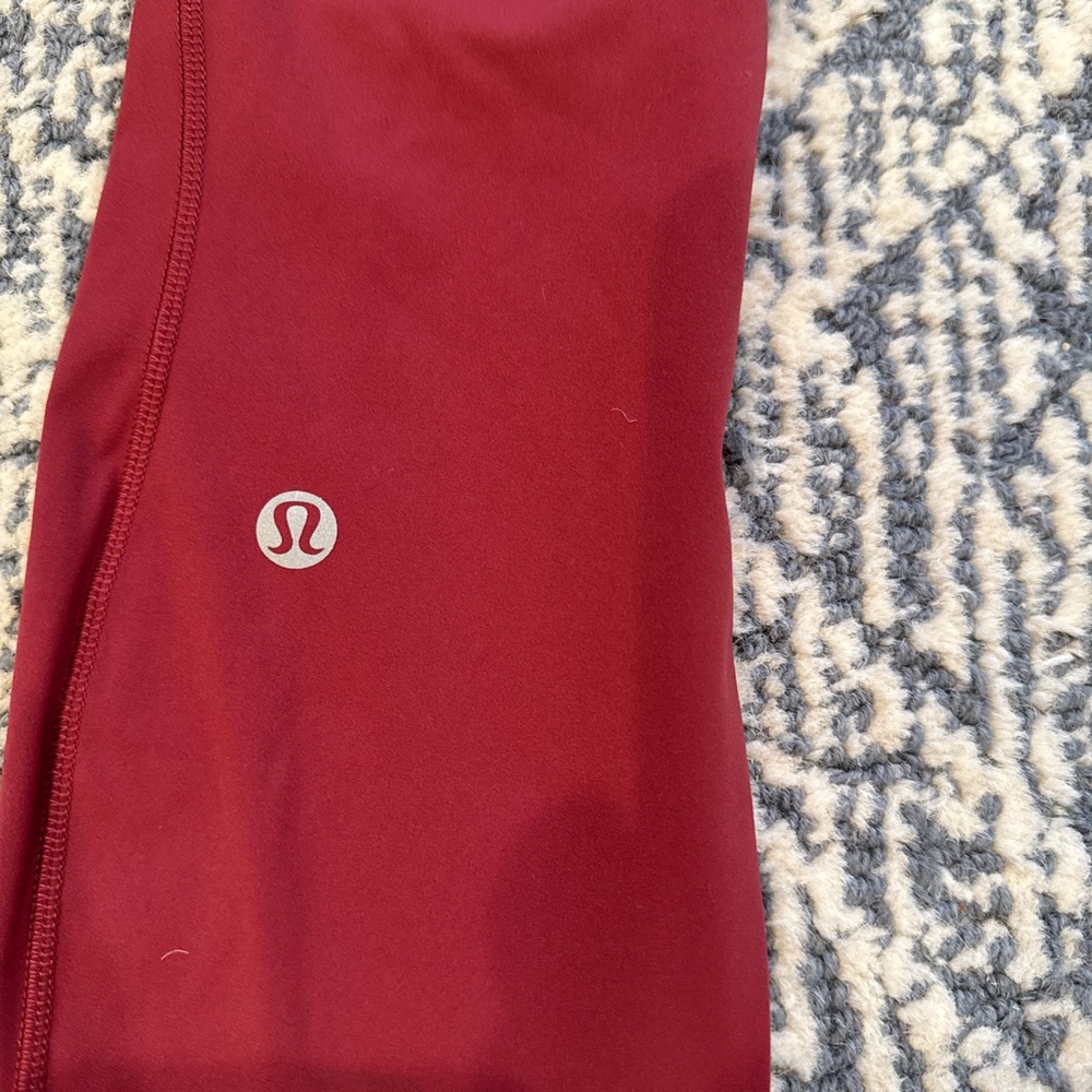 lululemon Maroon Wunder Tight Leggings. 27” length.